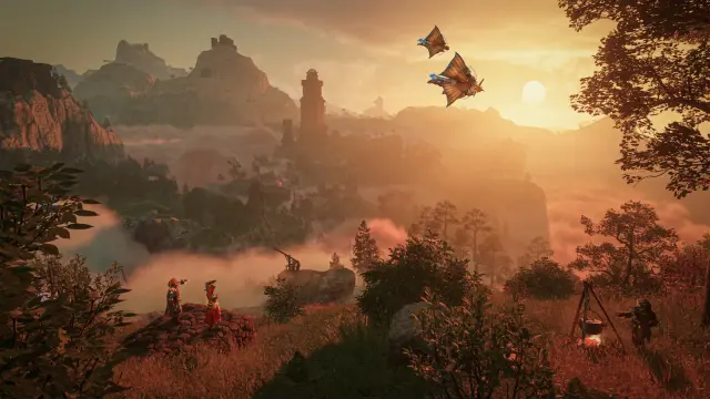 Embervale mountain terrain, a mist-covered valley and gliding players at sunset